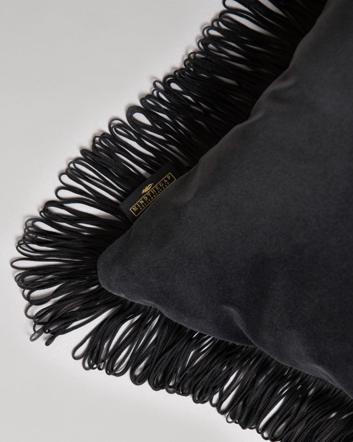 CHARCOAL Velvet Cushion (LC40234) by Mind The Gap | LC40234 | JAZZ LIVE | 50 x 50 cm | Black | Black fringes | Duck feather | Cotton velvet | Fabric Carolina | https://www.fabriccarolina.com/