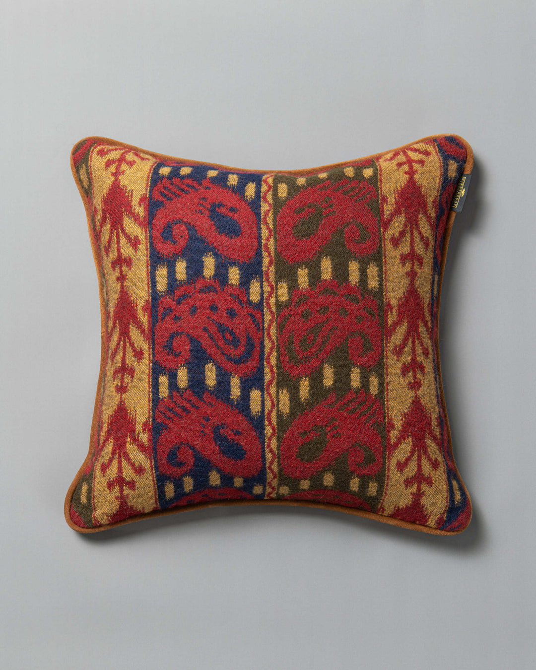 ERZSEBET cushion (LC40274) by Mind The Gap | LC40274 | TRANSYLVANIAN RHAPSODY | 50 x 50 cm / 20 x 20 in | Taupe, Blue, Red, Brown | Tasseled corners | Duck feather | 27% Acrylic, 32% Cotton, Other Fibers | Fabric Carolina | https://www.fabriccarolina.com/