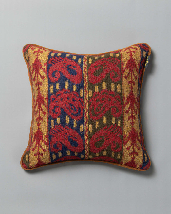 ERZSEBET cushion (LC40274) by Mind The Gap | LC40274 | TRANSYLVANIAN RHAPSODY | 50 x 50 cm / 20 x 20 in | Taupe, Blue, Red, Brown | Tasseled corners | Duck feather | 27% Acrylic, 32% Cotton, Other Fibers | Fabric Carolina | https://www.fabriccarolina.com/
