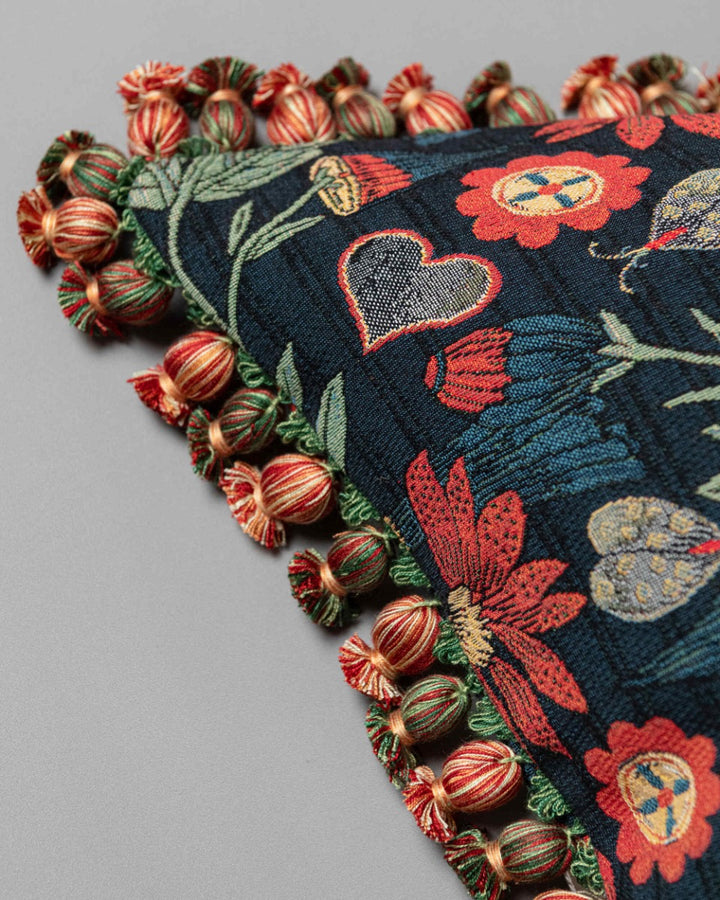 INFLORESCENCE cushion (LC40291) by Mind The Gap | LC40291 | TRANSYLVANIAN RHAPSODY | 50 x 50 cm / 20 x 20 in | Taupe, Blue, Red | Fringes all around | Duck feather | 74% Cotton, 10% Acrylic, Other Fibers | Fabric Carolina | https://www.fabriccarolina.com/