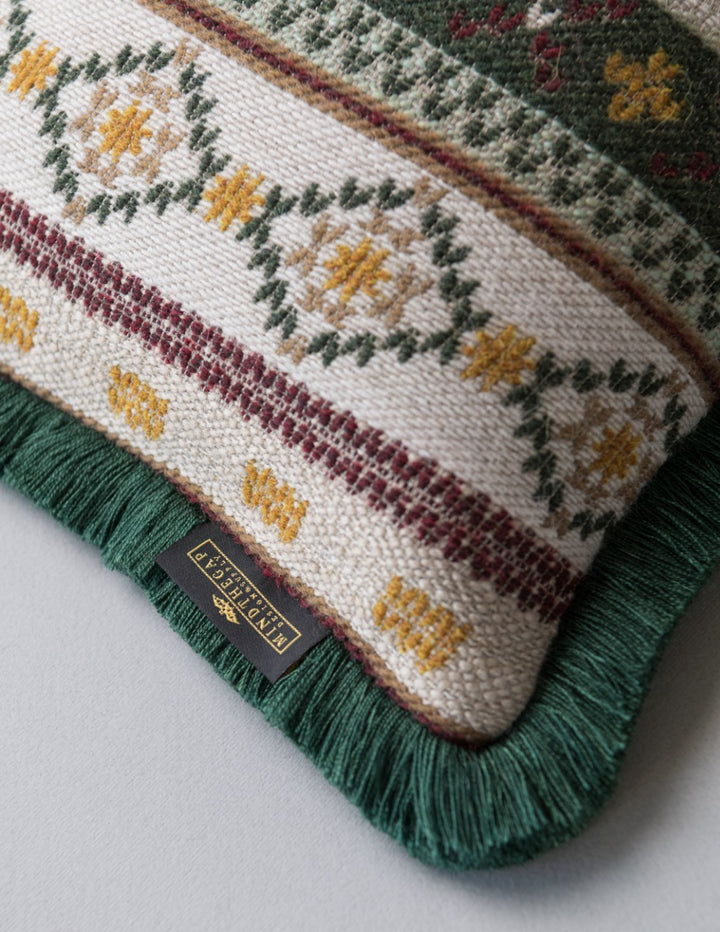 GAISSTEIN Cushion - Rectangular (LC40196) by Mind The Gap | LC40196 | TYROL APRES-SKI | 50 x 30 cm | Taupe, Light Green, Dark Green | Fringes all around | Duck feather | 40% Cotton, 27% Polyacrylic, 20% Wool, 13% Other Fibers | Fabric Carolina | https://www.fabriccarolina.com/