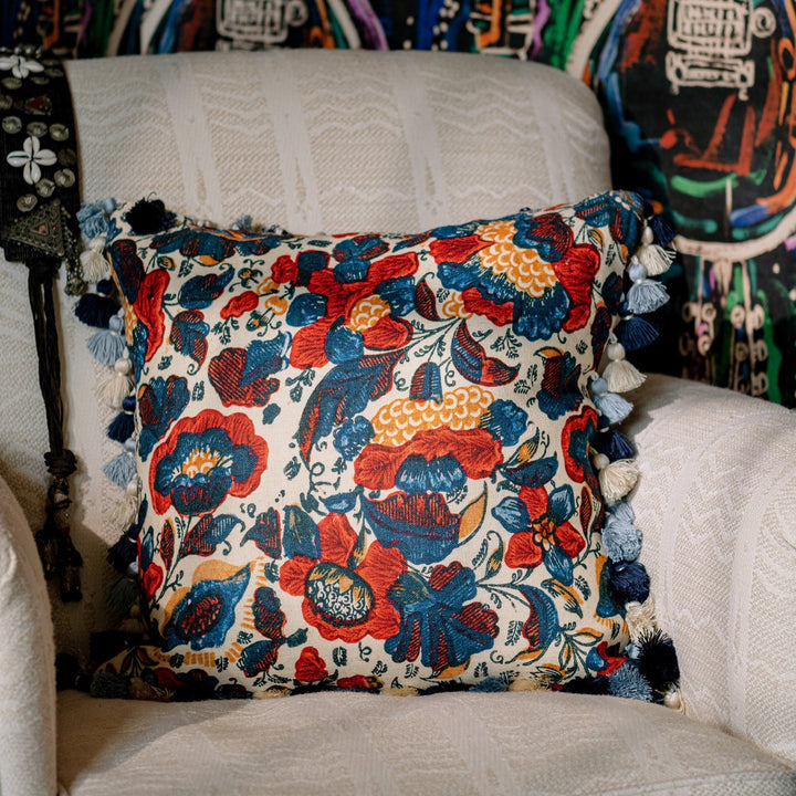 Remondini Floral Cushion by Mind the Gap Designer Pillow WOODSTOCK '69 LIFESTYLE COLLECTION 100% Linen, printed and stonewashed Made in Romania Tassels all around 20 x 20 in - Swanky Fabrics -